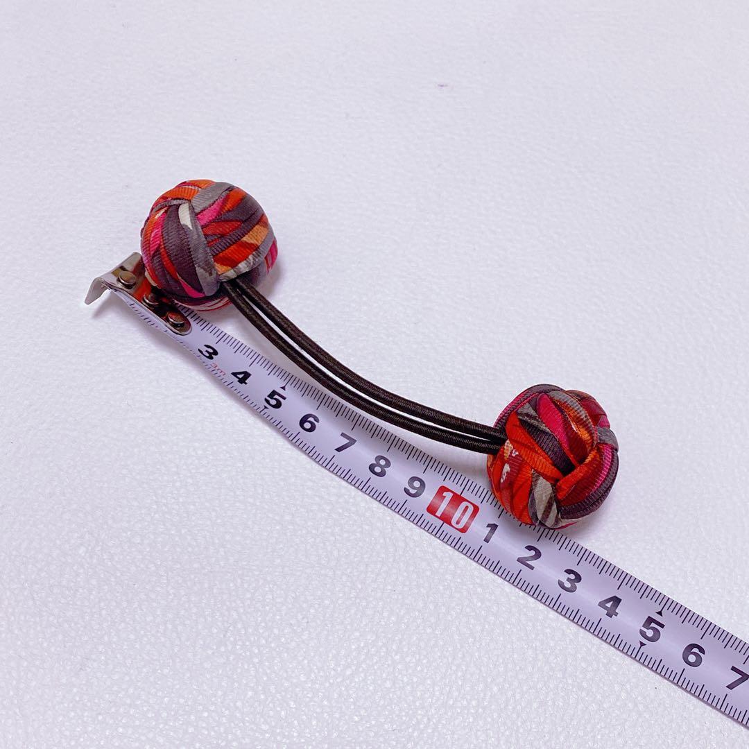 美品 エルメス HERMES ヘアゴム 髪ゴム ポンポン 赤系