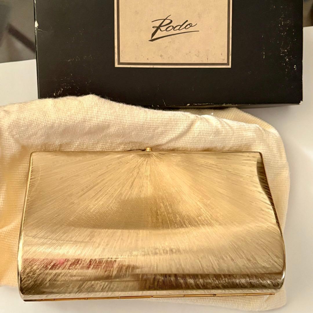 Rodo ゴールド クラッチバッグ