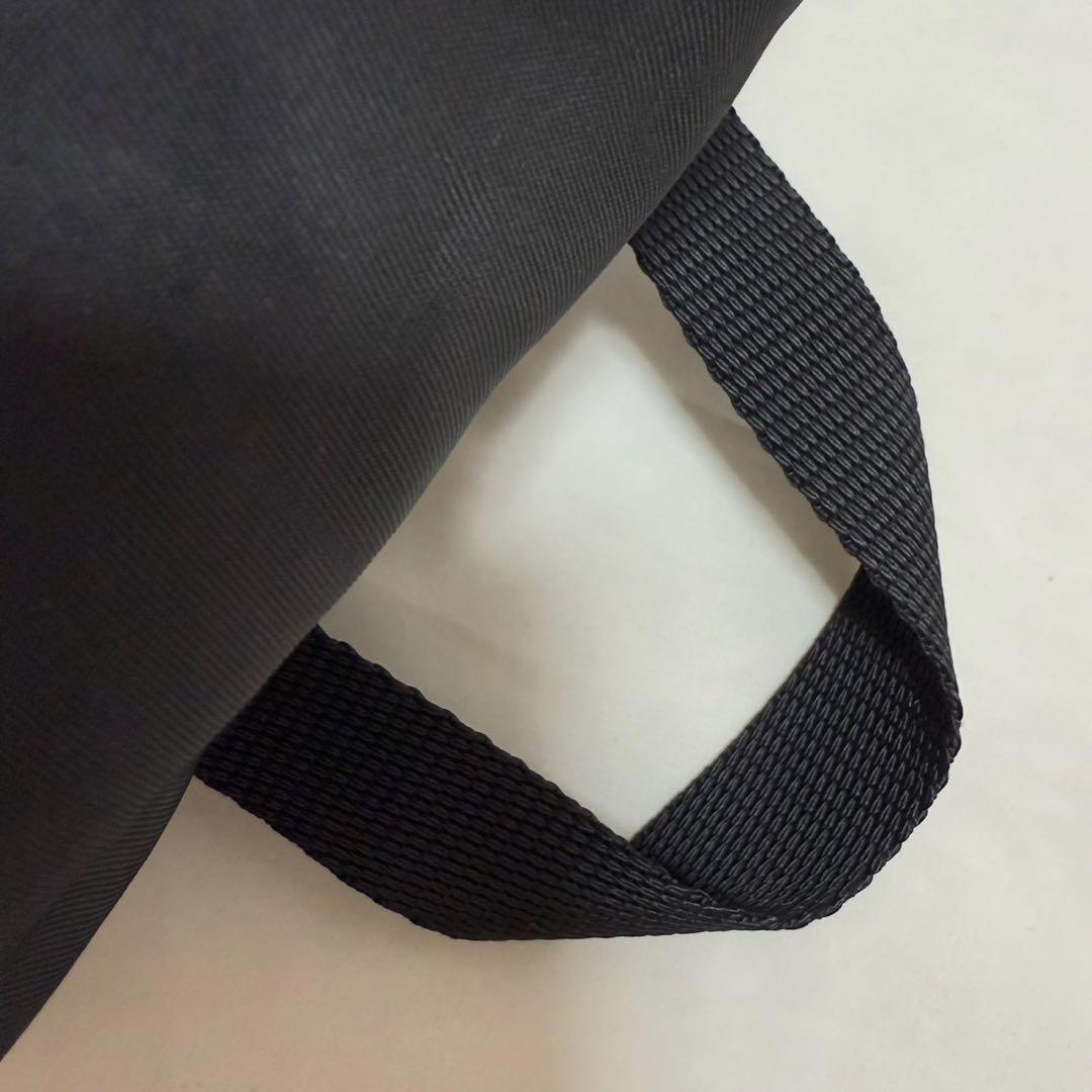 【美品】プラダ リュック バックパック 巾着バッグ ナイロン 三角プレート 黒