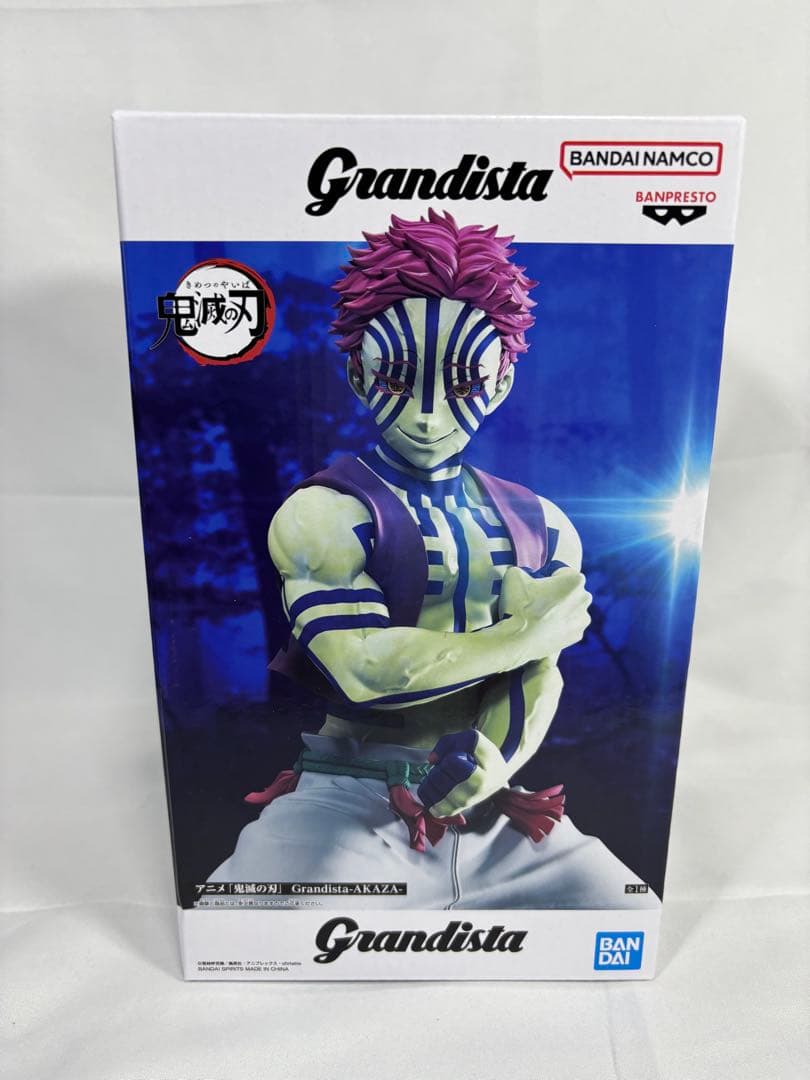 鬼滅の刃　猗窩座フィギュア、缶セット