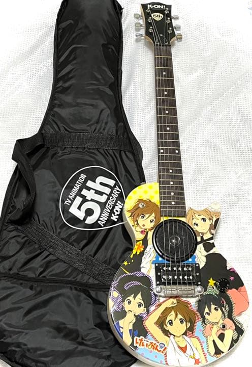 けいおん！5周年スピーカー内蔵 痛ギター - メルカリ