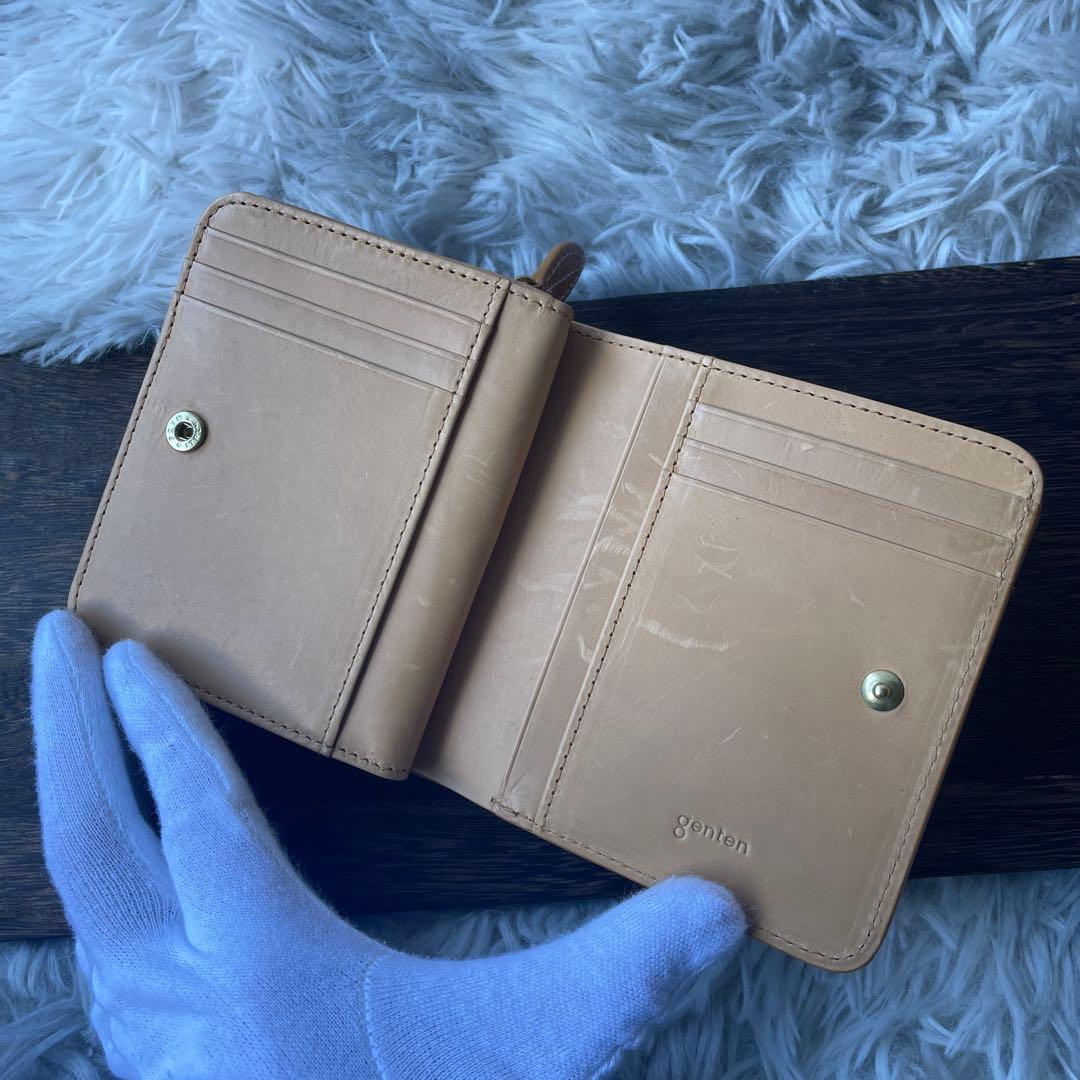 極美品】ゲンテン フラッターカットワーク 二つ折り財布 ヌメベージュ