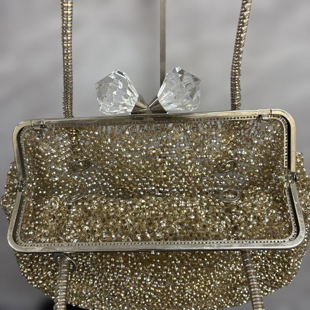 アンテプリマ　ワイヤーハンドバッグ　がま口　リボン　ゴールド