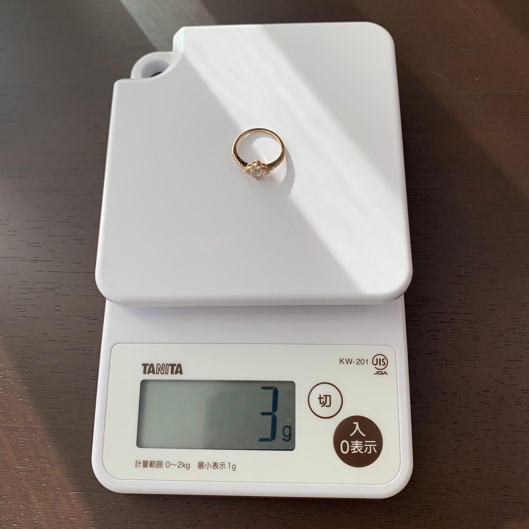 鑑別書付 K18PG 0.71ct四つ葉クローバーミル打ち天然ダイヤモンドリング