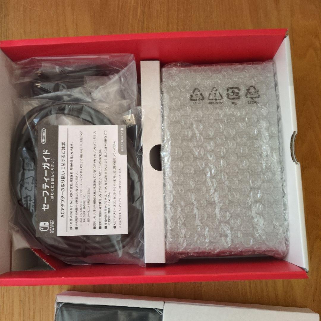 Nintendo Switch 本体（新品未使用）＆　収納バッグ（中古品）