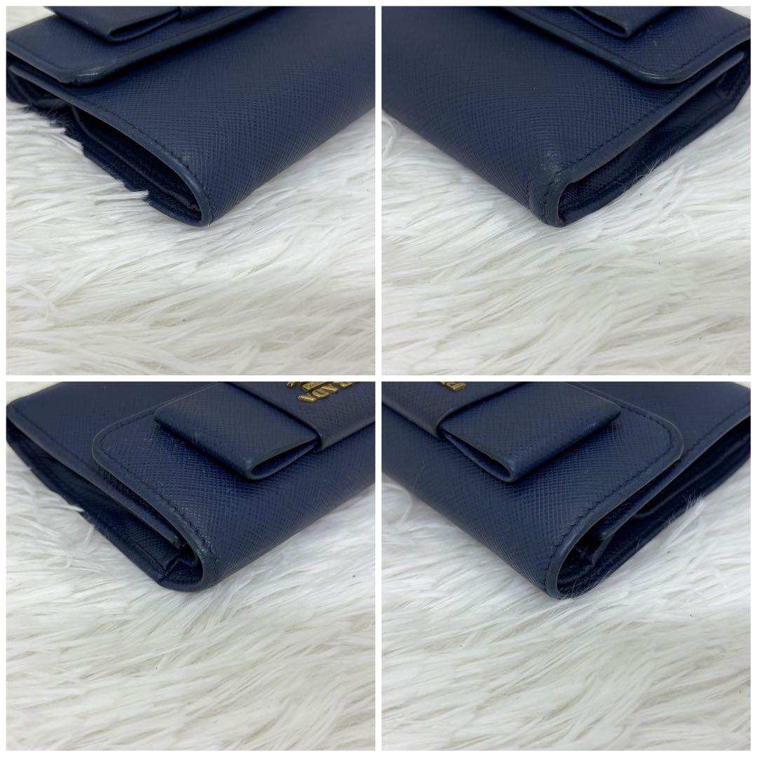 美品✨プラダ 三つ折り財布 財布 サフィアーノ レザー リボン ネイビー 紺