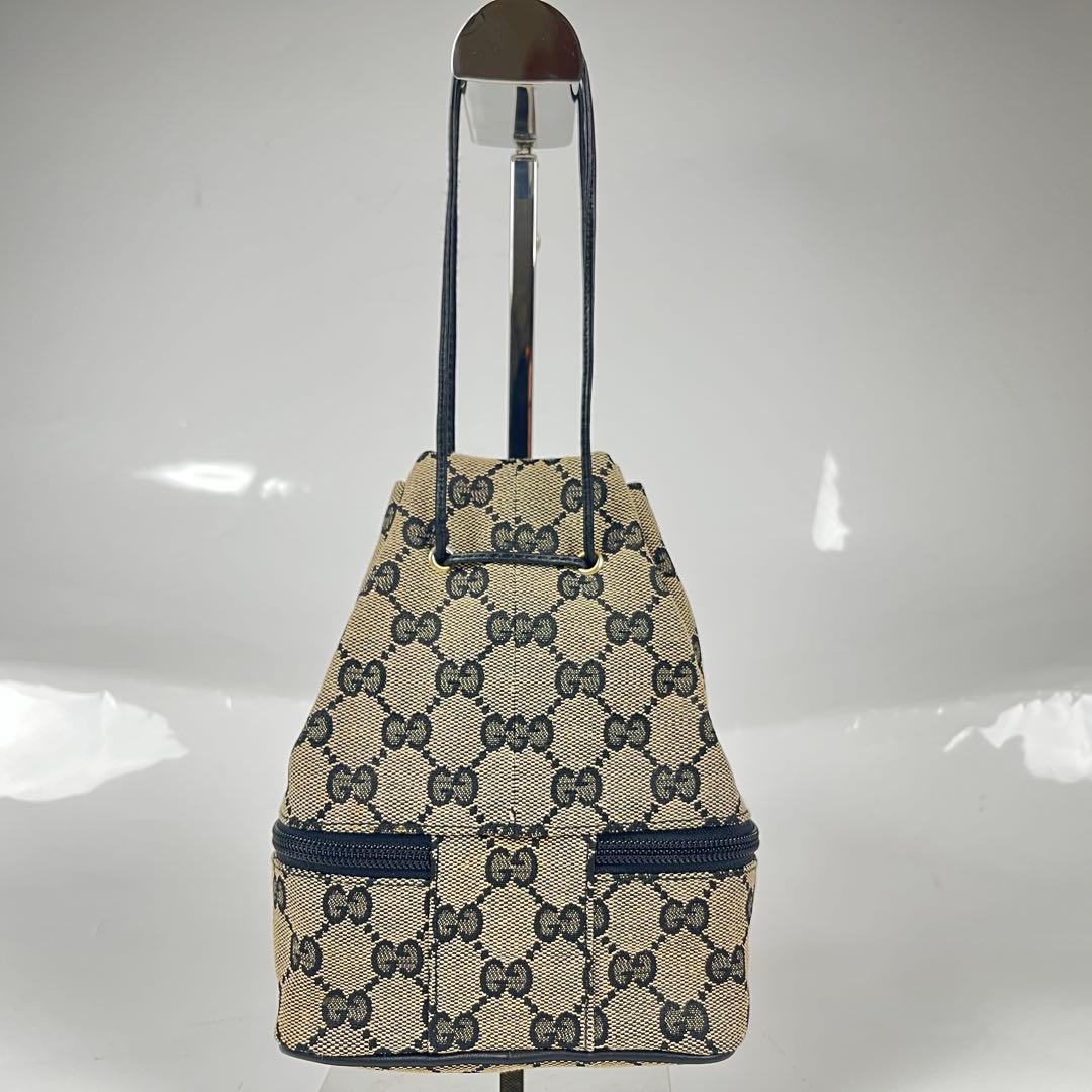 【極美品】GUCCI GGキャンバス プレート バニティポーチ 巾着 ミニバッグ