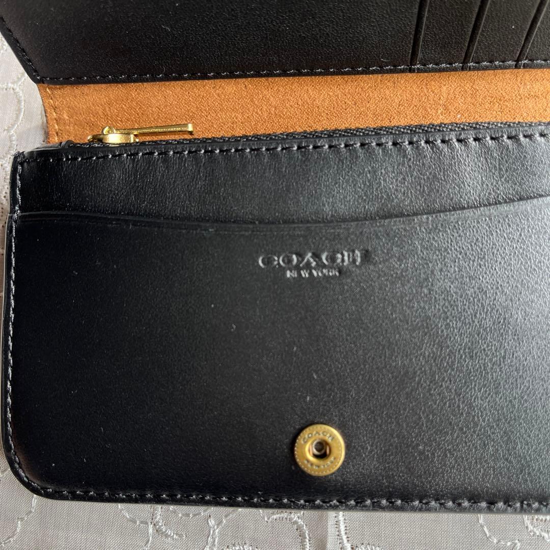 COACH 二つ折りミニ財布