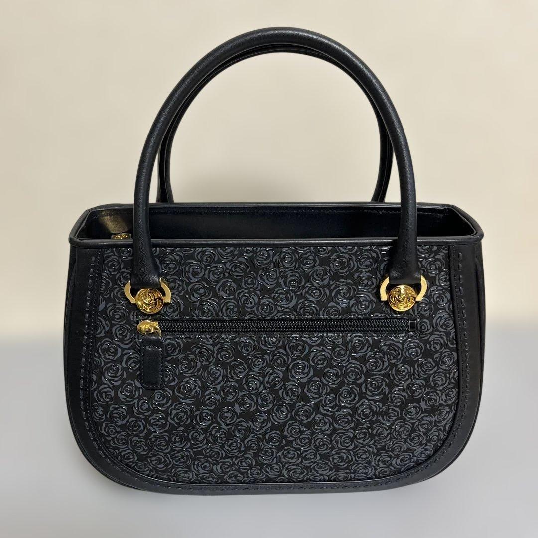 【新品未使用】印傳屋　バラ模様 黒 レザーハンドバッグ