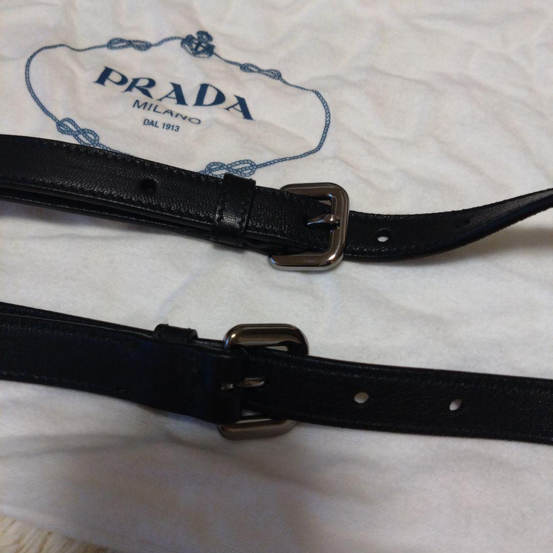 PRADA ブラックレザーショルダーストラップ（袋付き）｜Prada] [プラダ