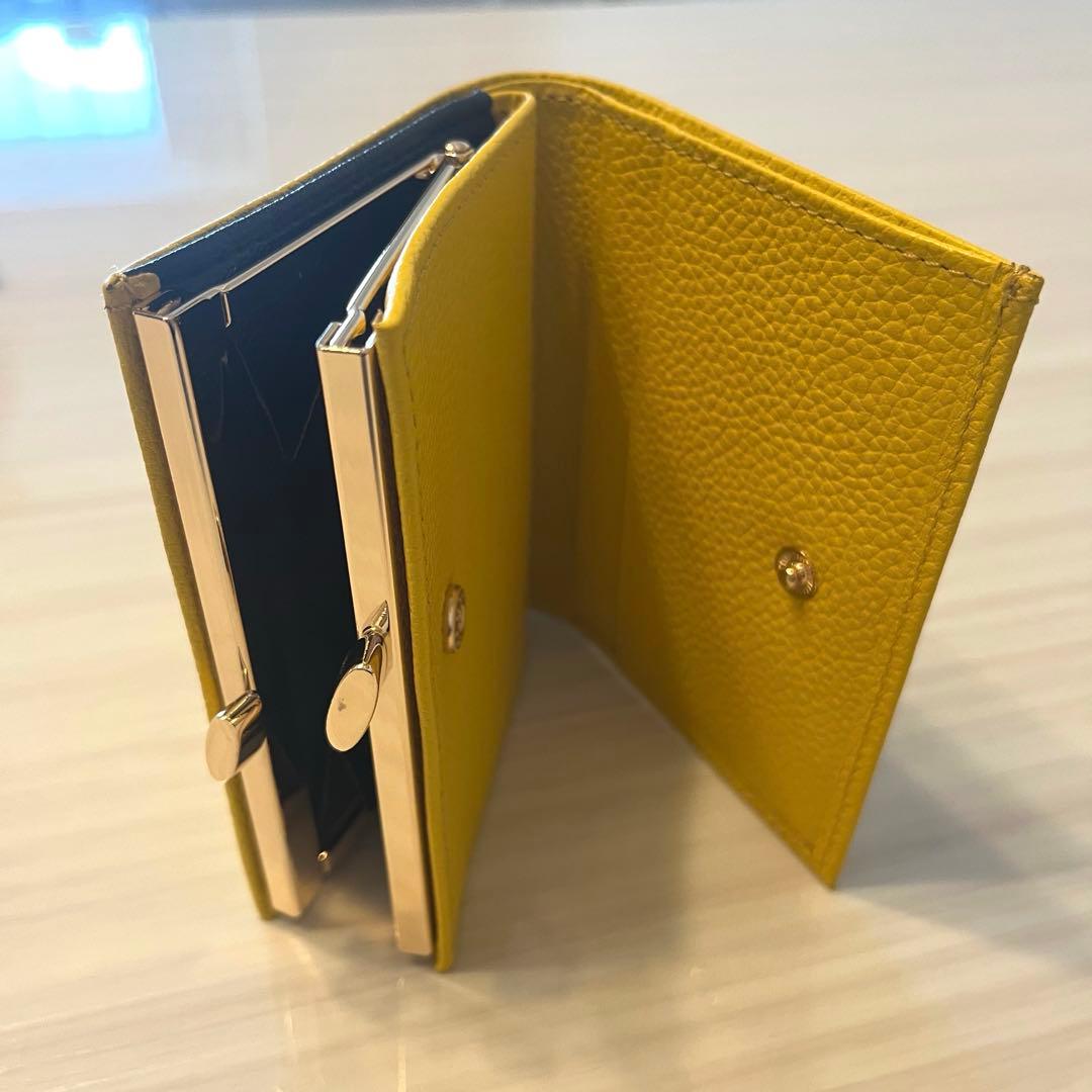 新品・未使用】皇居 二つ折り財布 黄色 イエロー がま口 - メルカリ
