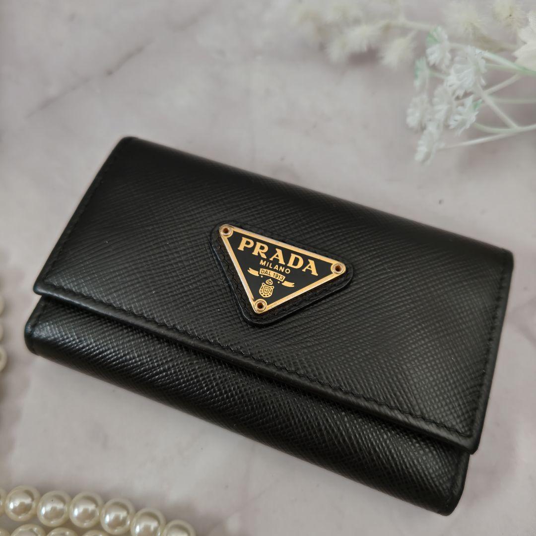 PRADA プラダ キーケース 6連 サフィアーノレザー 三角ロゴ - メルカリ