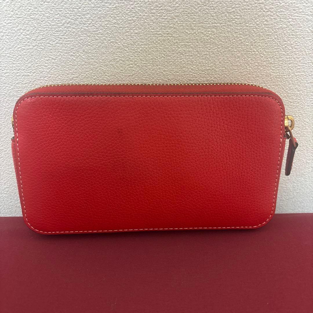 COACH レッド恐竜刺繍ポーチ