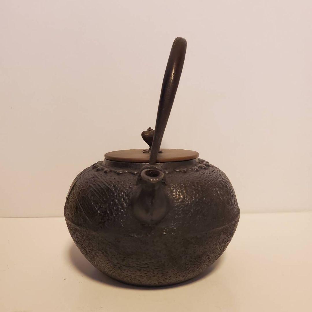 龍文堂鉄瓶古銭文様取手銀象篏