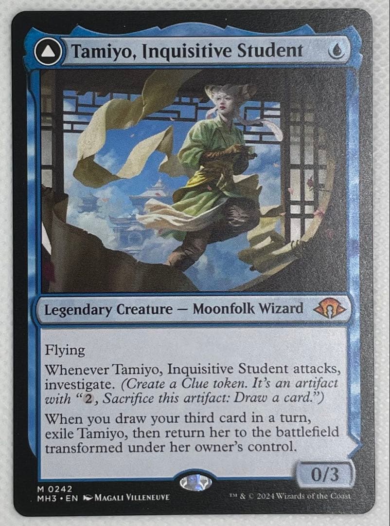 MtG 知りたがりの学徒、タミヨウ 英語版