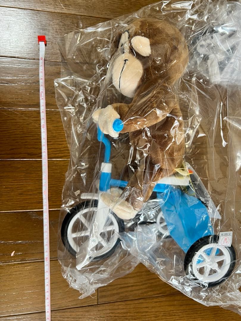 8個★おさるのジョージ 電池で動く三輪車ぬいぐるみ Curious e