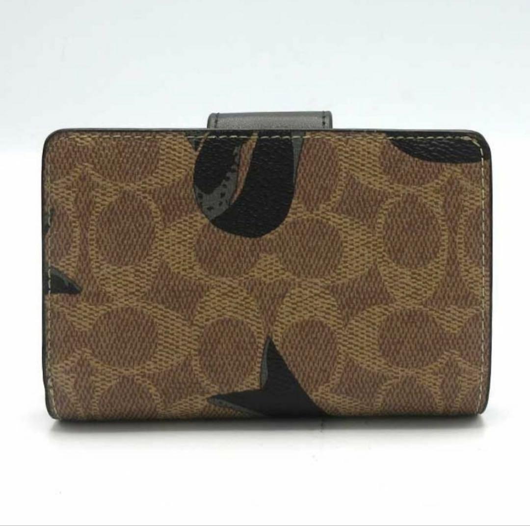 プレゼント 新品未使用 コーチ シグネチャー 二つ折り財布 リボン柄 大人可愛い