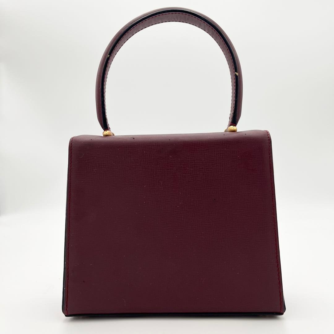 カルテイェ マストライン ターンロック ボックスカーフ ミニハンドバッグ 総柄