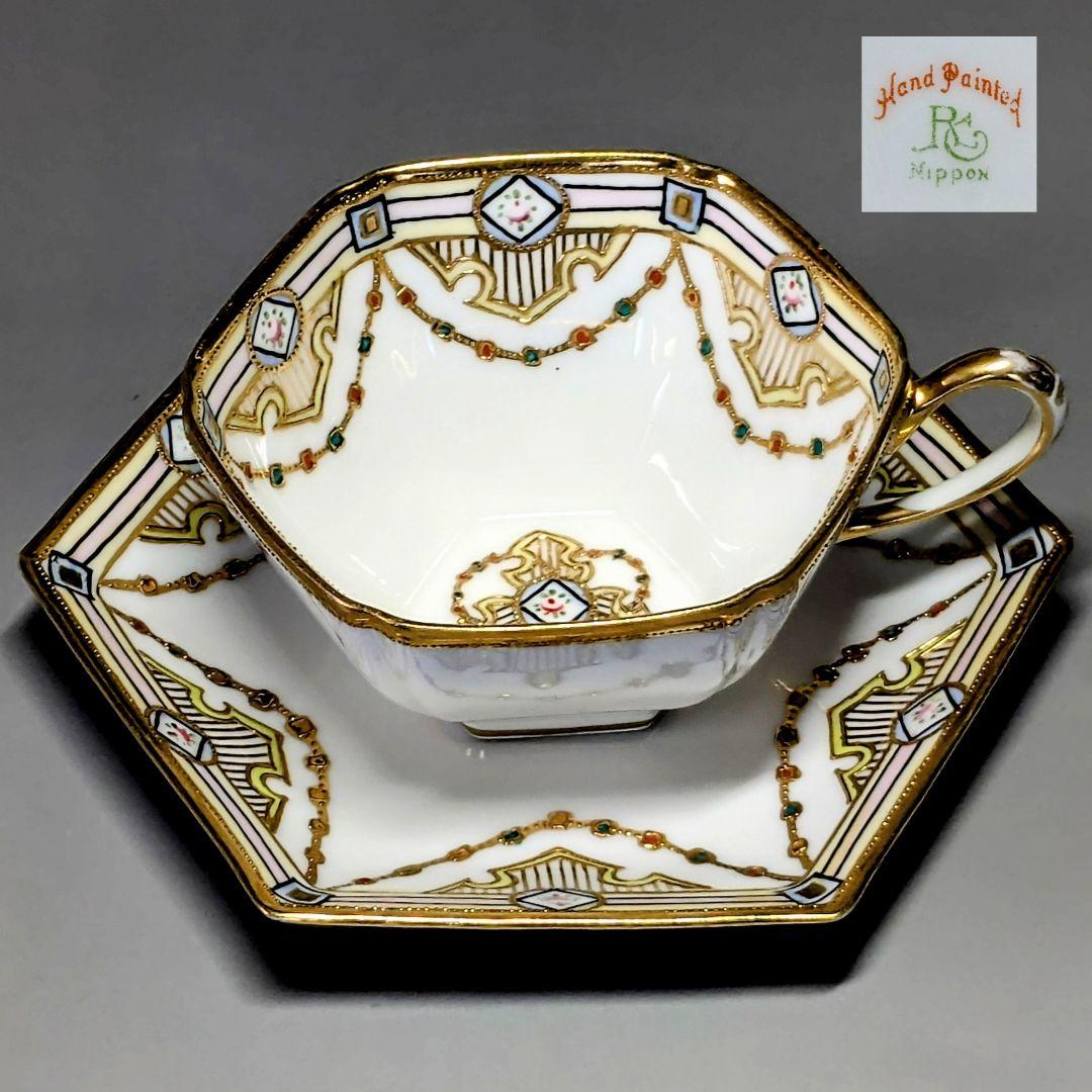 オールドノリタケ・金盛上陽刻薔薇柄　ガーランド装飾　ヘキサゴン　カップ＆ソーサー オールドノリタケ・金盛上陽刻薔薇柄 ガーランド装飾 ヘキサゴン