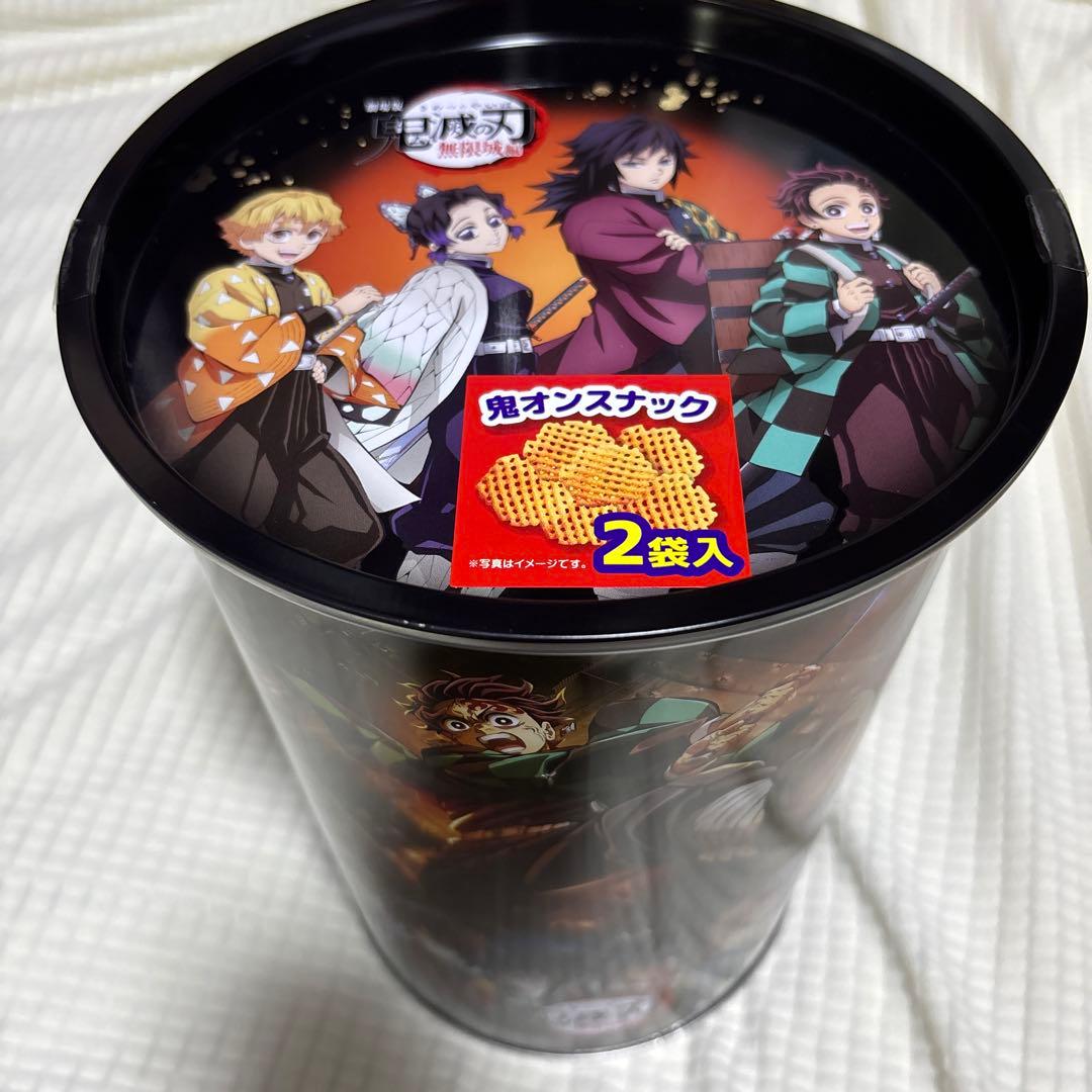 鬼滅の刃 鬼オンスナックBIG缶 - メルカリ