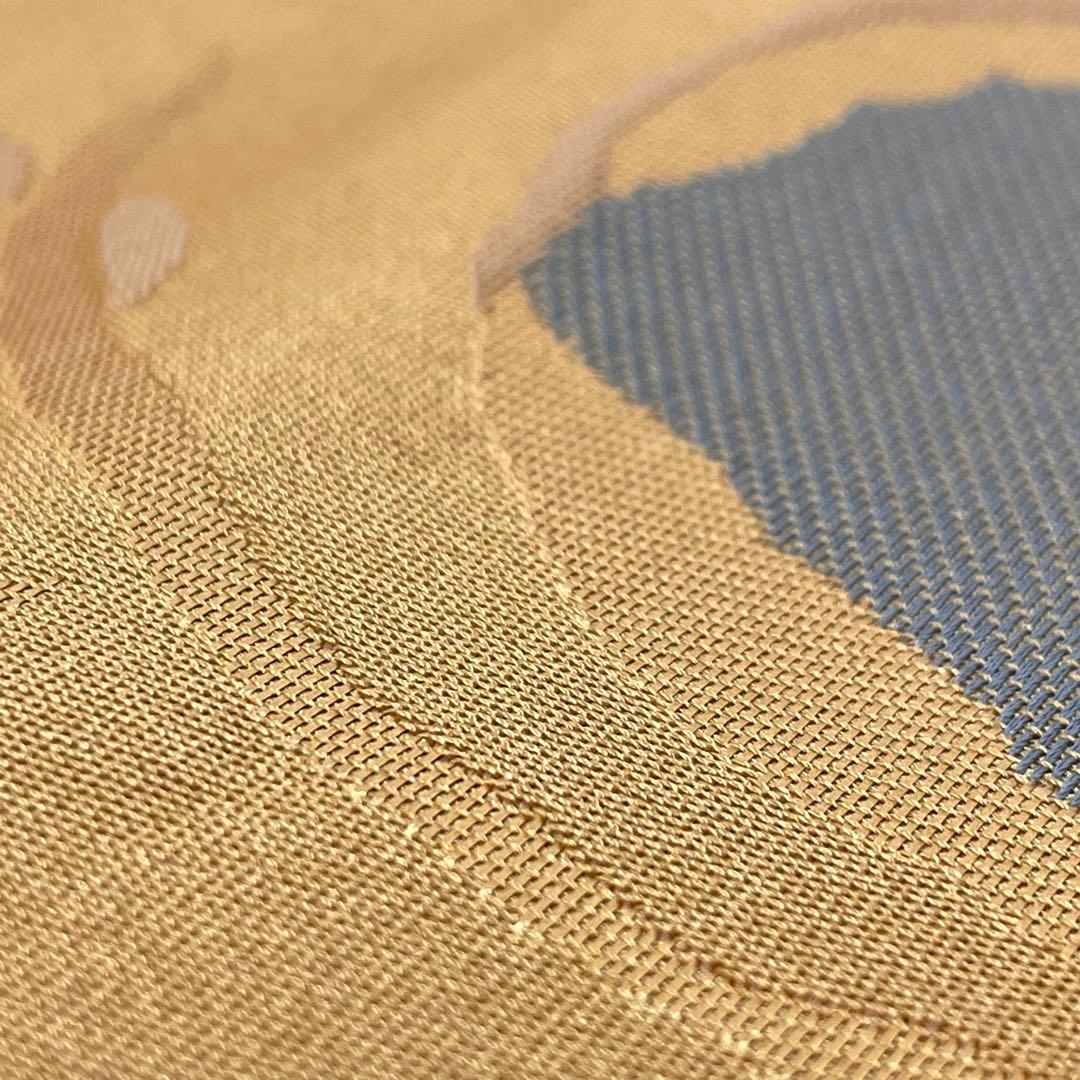 名古屋帯/ポリエステル ］化繊 柔らかい橙系の色 蝶 洗濯 洗える