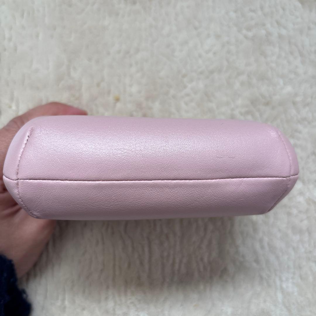 coach 薄いピンクのがま口ケース