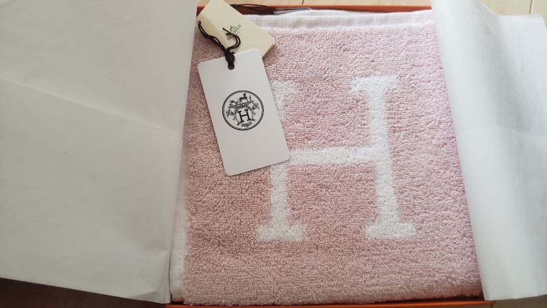 HERMES ピンク フェイスタオル Hのロゴ入り タオル・バス用品