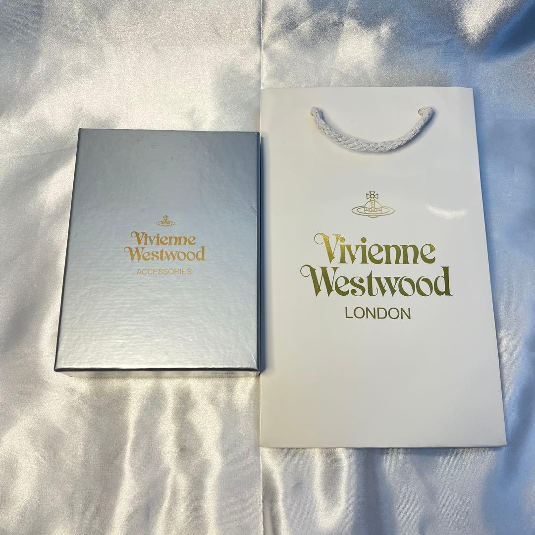 新品 Vivienne Westwood レッド ヴィヴィアン柄 三つ折り財布 - メルカリ