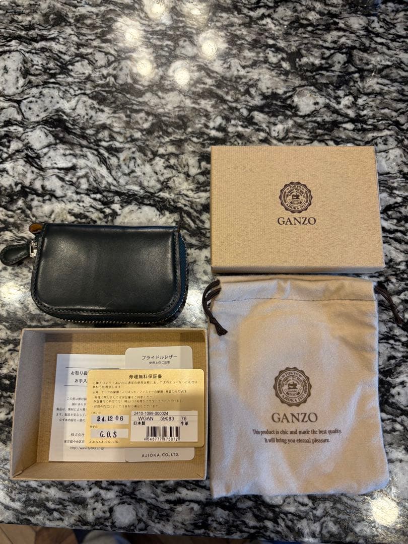 ガンゾAVON (エイボン)ラウンドファスナーキーケース - メルカリ