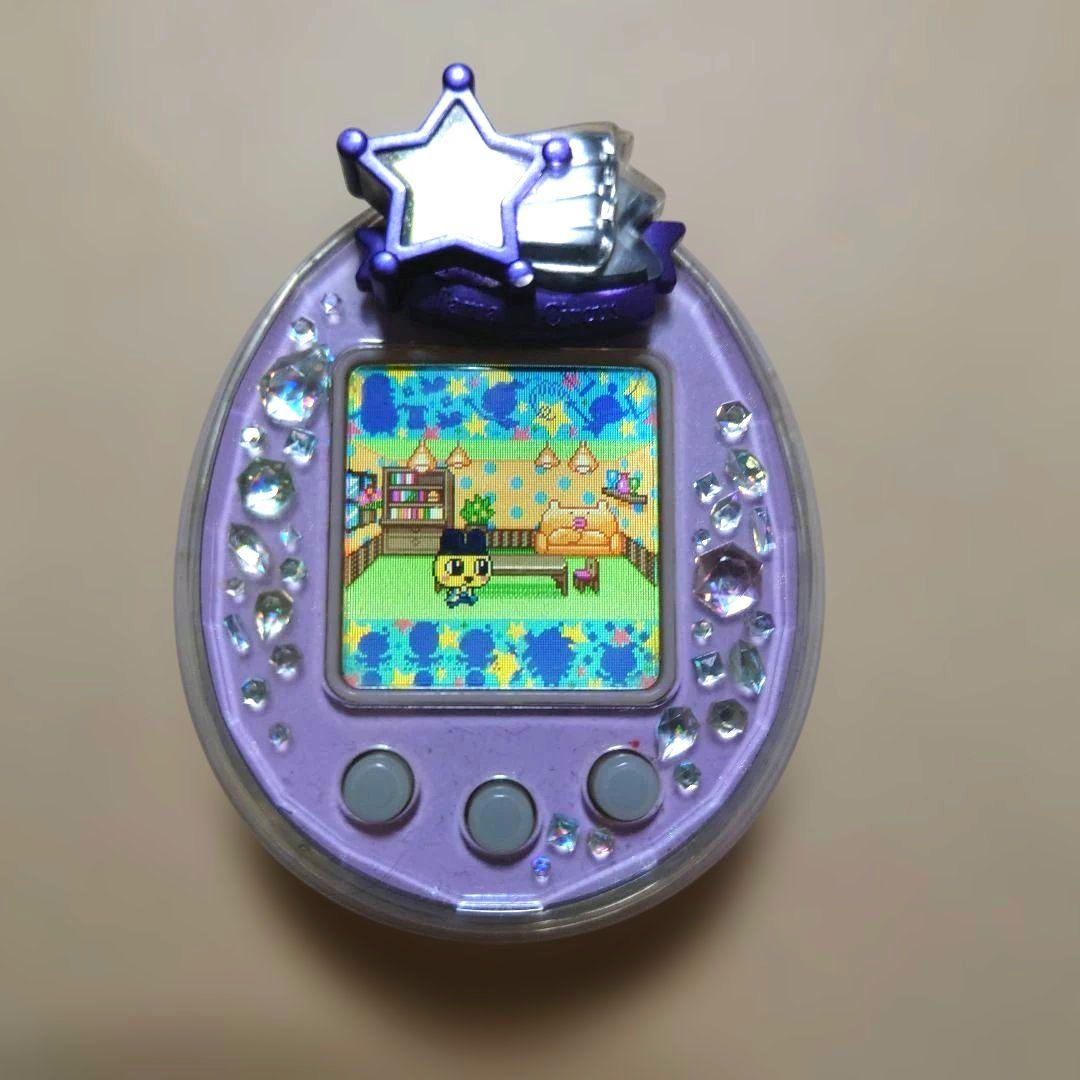 動作確認済み】たまごっちピース パープル たまデコピアス付き - メルカリ