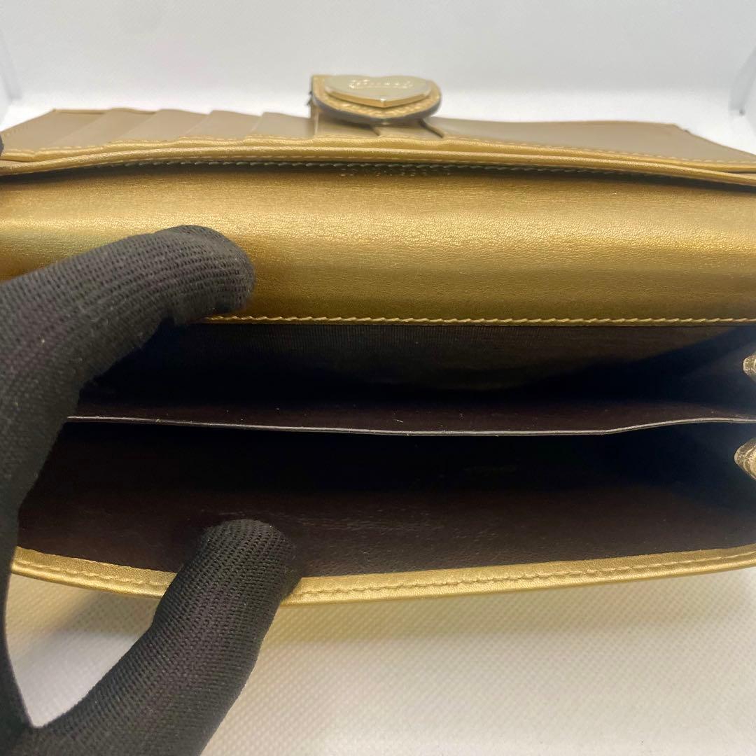 GUCCI ゴールド 二つ折り 長財布 ハート コンチネンタル GGシマ
