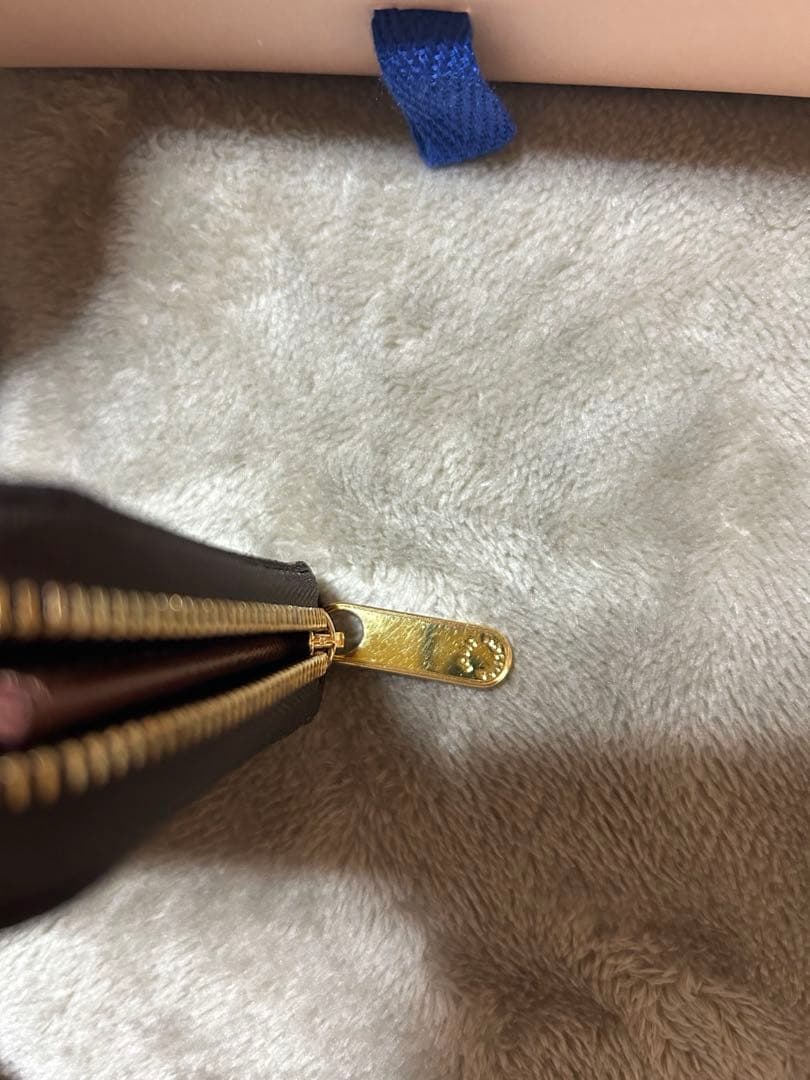Louis Vuitton ジッピー・パース