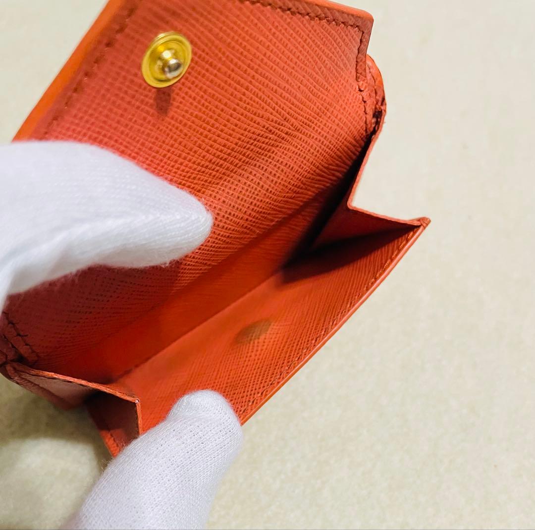 PRADA オレンジ 三つ折り財布