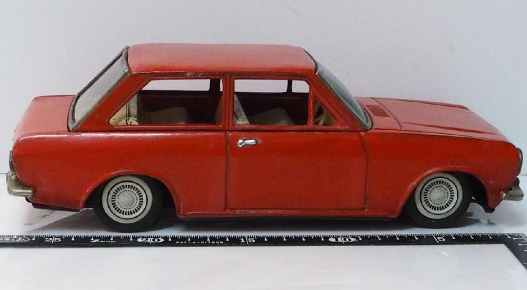 増田屋【ダットサン サニー 1000 リペイント橙】当時物ブリキ製ミニカー 箱無