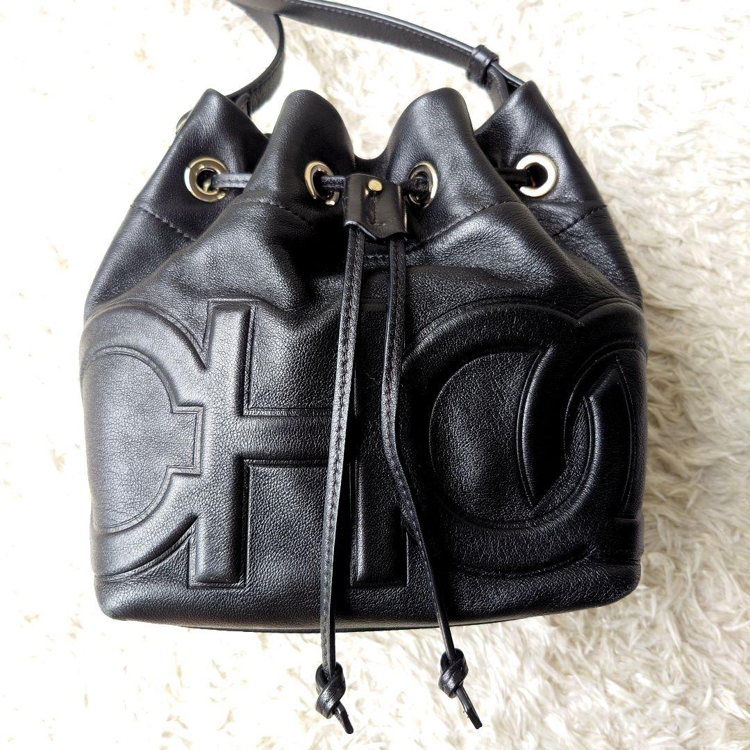 Jimmy Choo ジュノ 巾着 ブラック 型押しロゴ デカロゴ