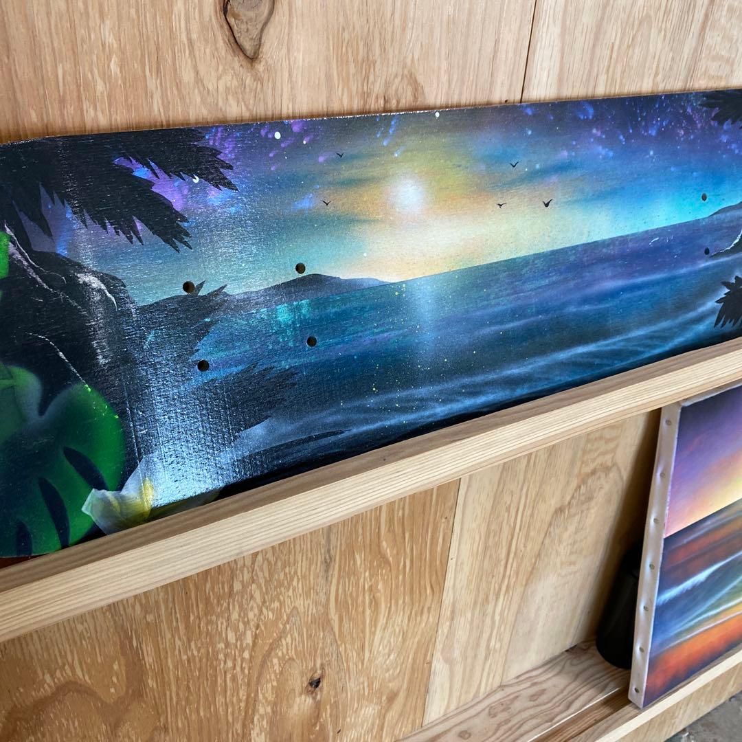 海と夕日のグラフィック スノーボード スプレーアート