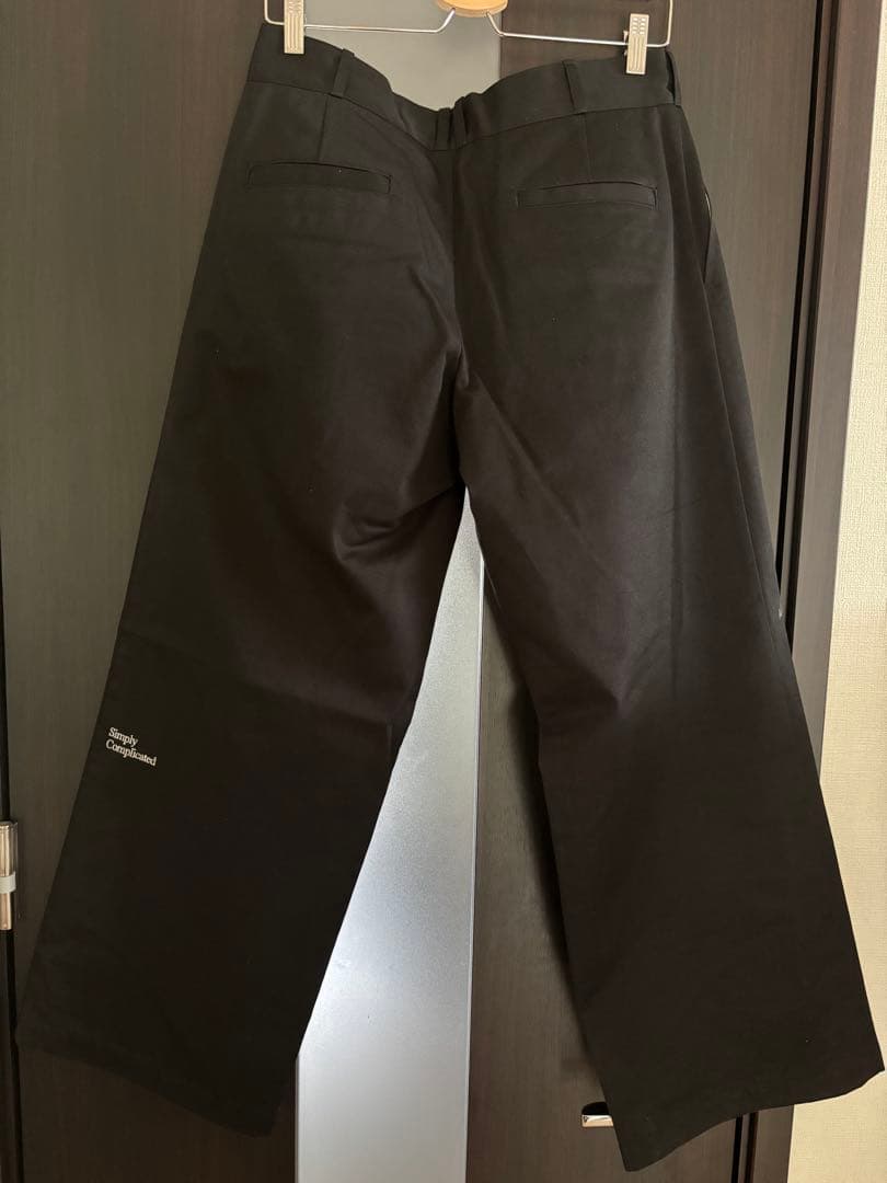 simply complicated loose fit trousers