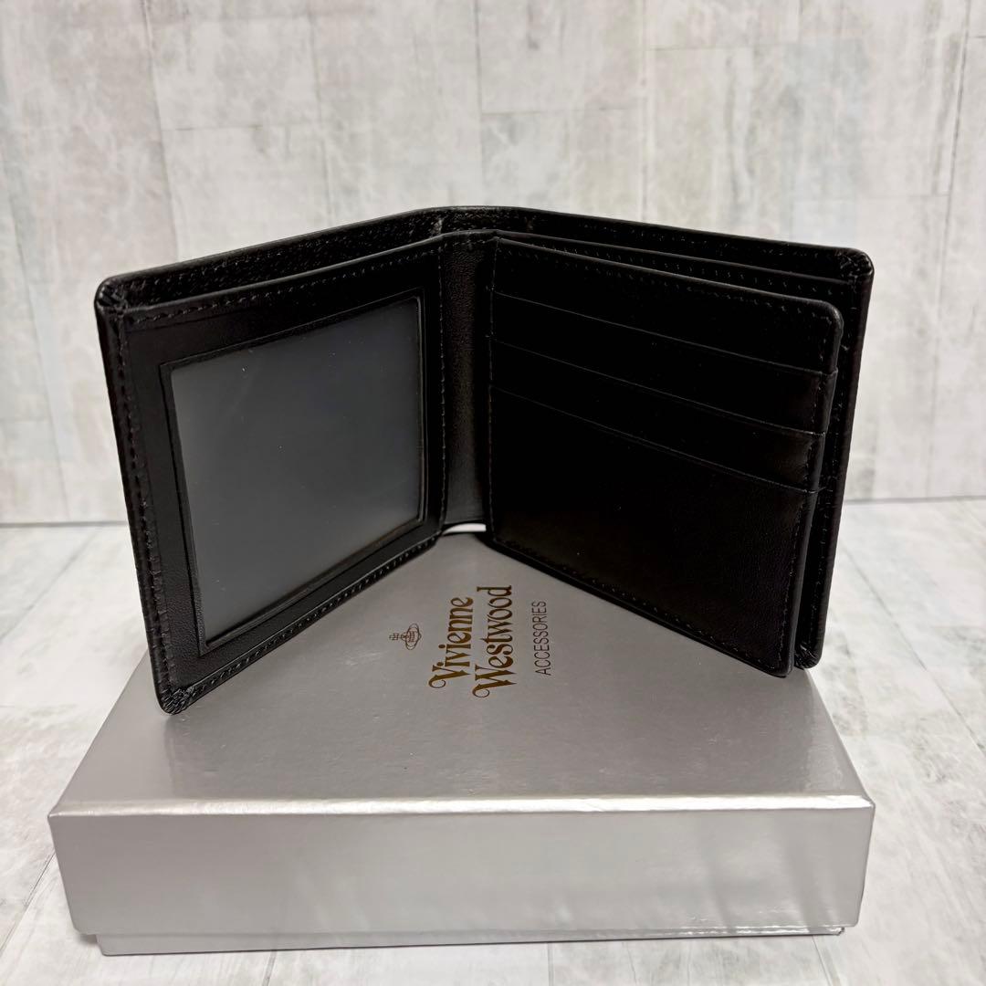 美品】Vivienne Westwood ブラック 二つ折り財布 - メルカリ