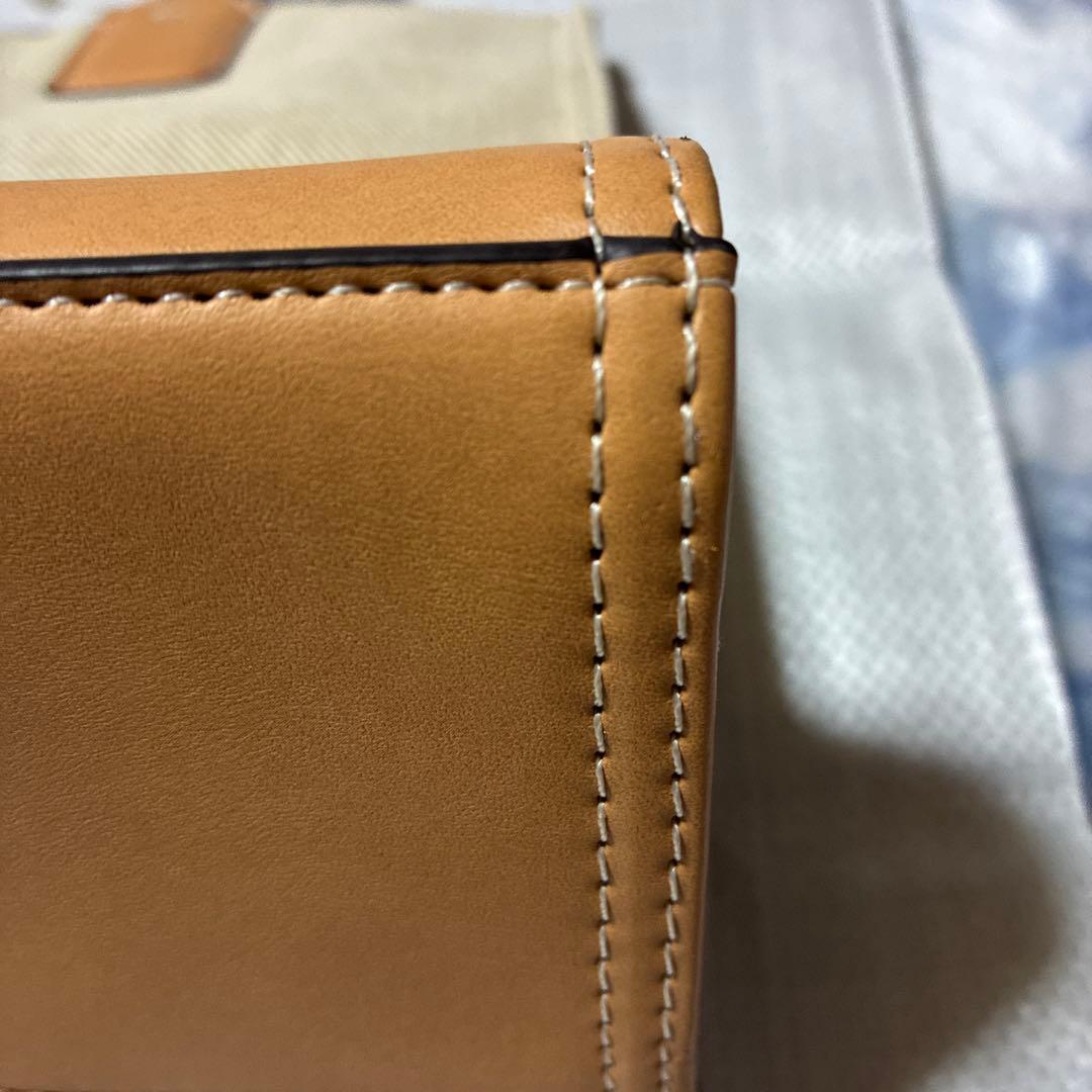 トリーバーチデカロコハンドバッグベージュ