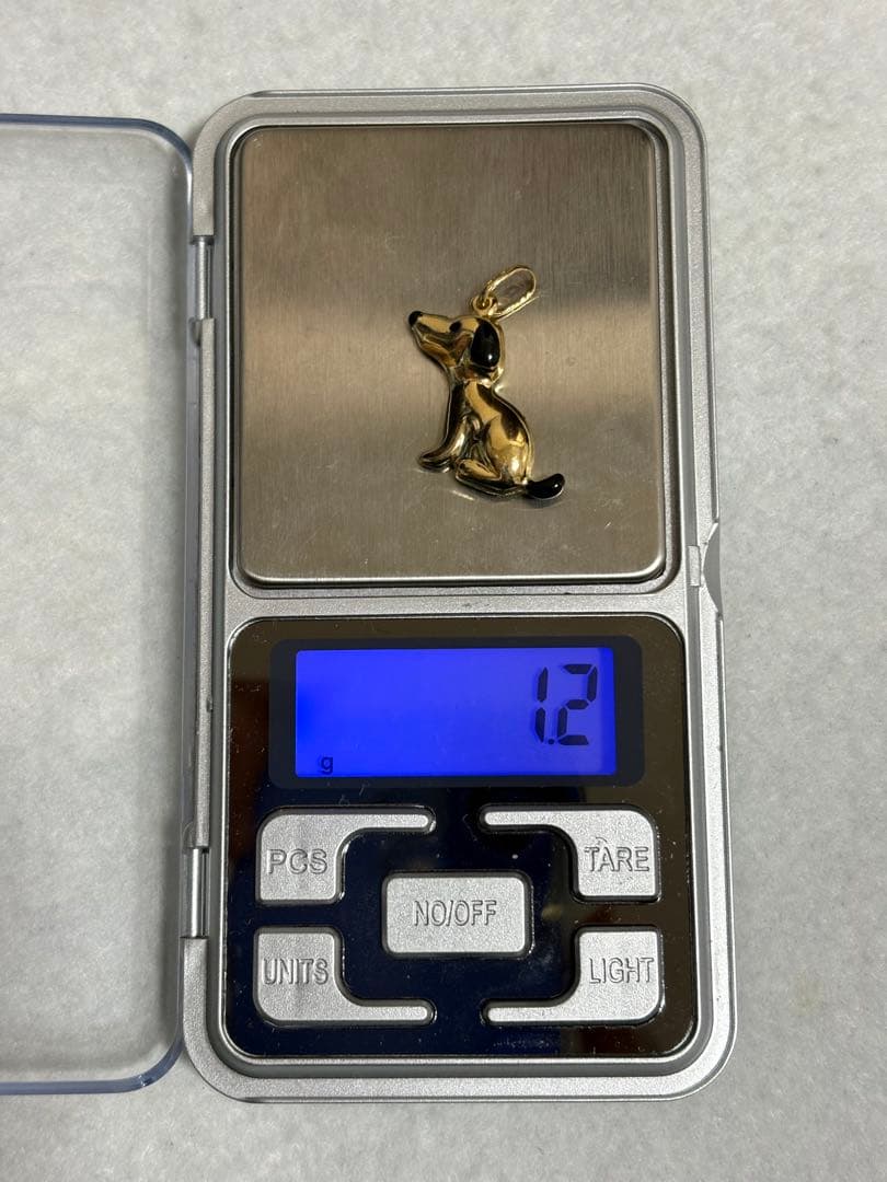 750 (K18) UNOAERRE 犬モチーフ　ペンダントトップ