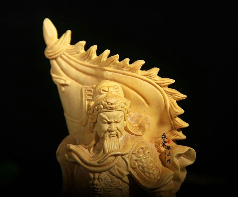 黄楊の木の旗は振り子の黄楊の木の彫刻に勝ってい