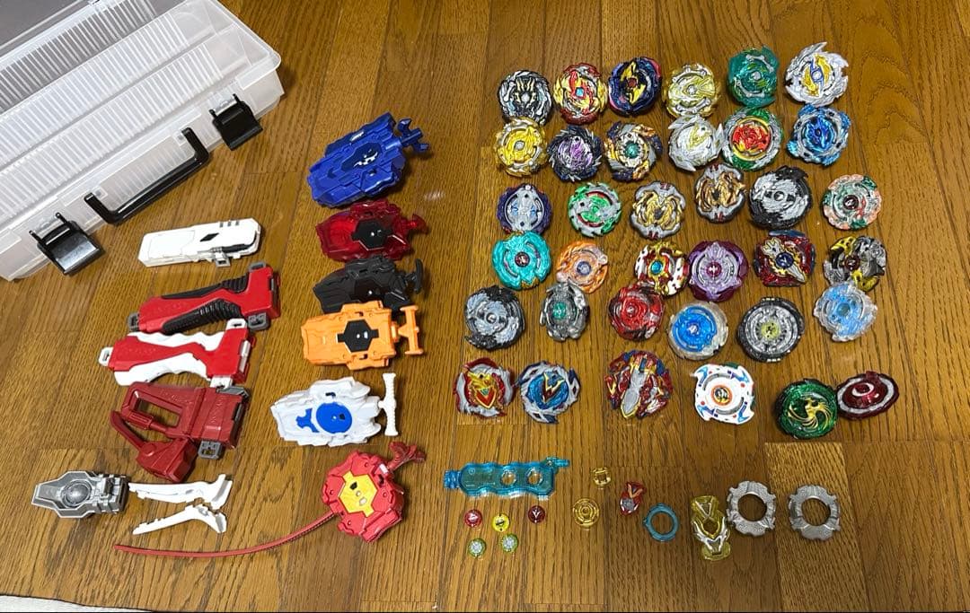 ベイブレードバースト 40個+ランチャー等 引退 まとめ売り ベイブレードバースト 40個+ランチャー等 引退 まとめ売り - スポーツ