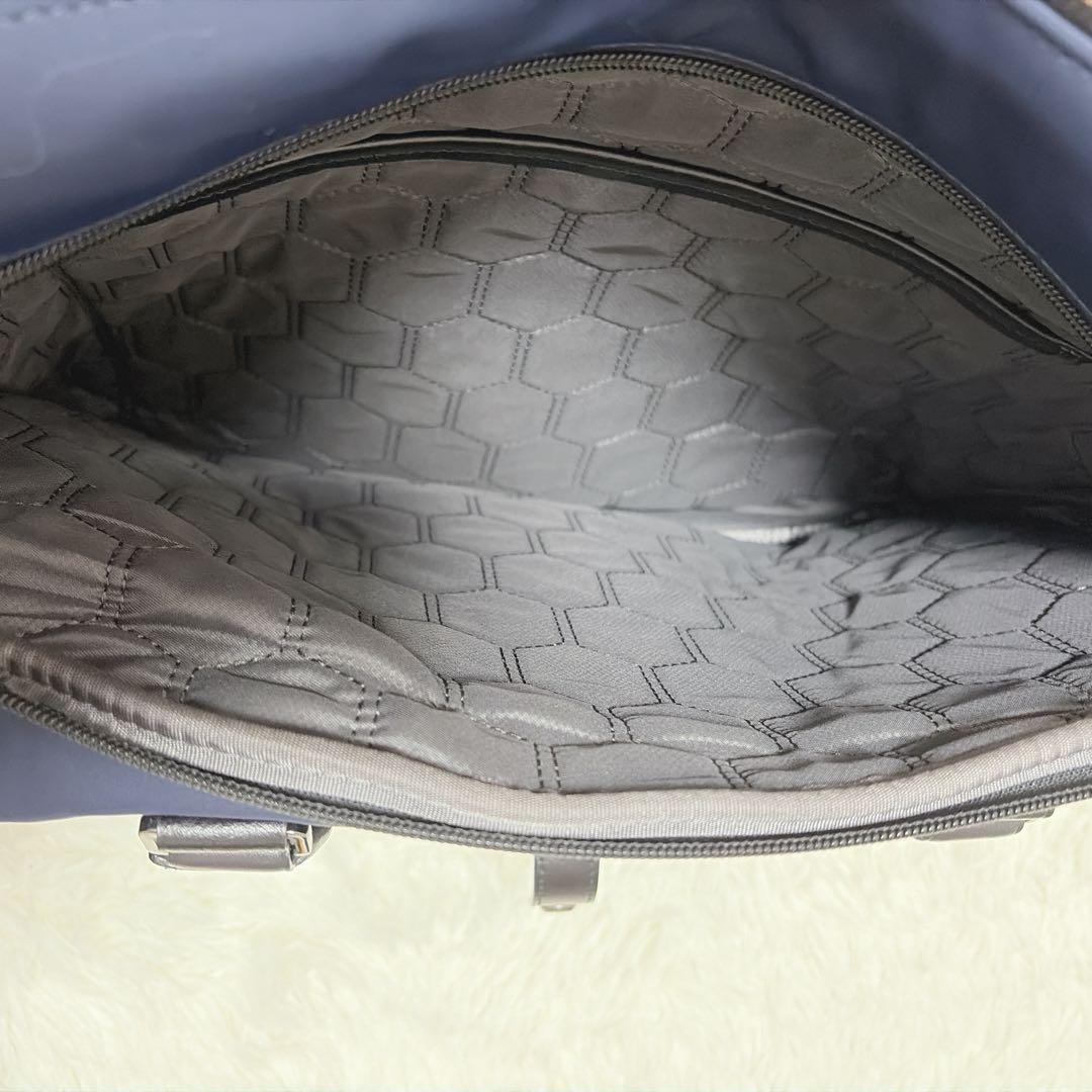 TUMIビジネスバックHarrisonサニーコンバーチブル・ブリーフ