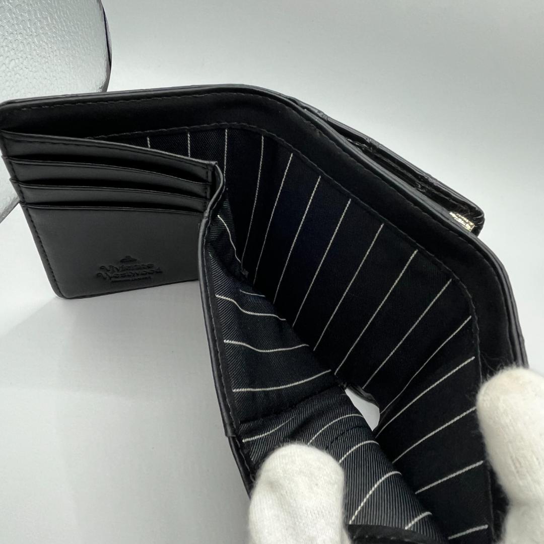 Vivienne Westwood 特価 未使用 がま口 折財布 黒 ウロコ柄 - メルカリ