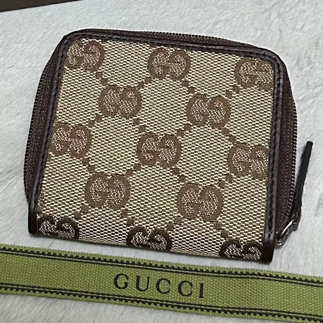 GUCCI ケース　キャンバス　ラウンドファスナー　GG メタルロゴ