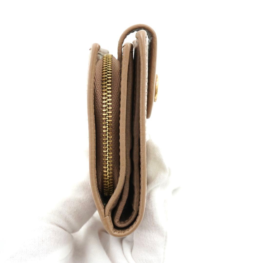 ✨未使用展示品✨　GUCCI ミニ財布　マーモント　二つ折り　エンボスロゴ　GG