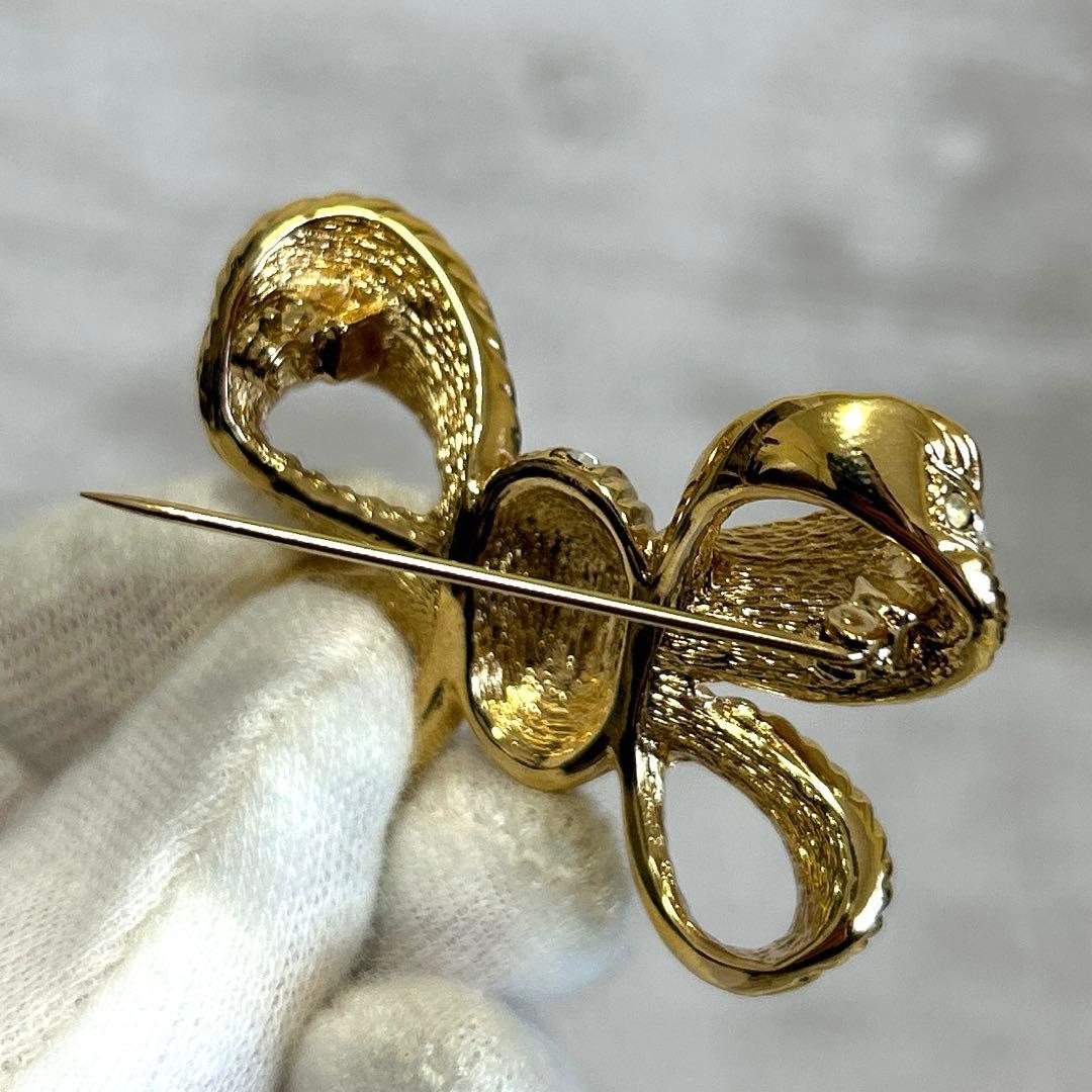 クリスチャンディオール リボン ブローチ ラインストーン ゴールド