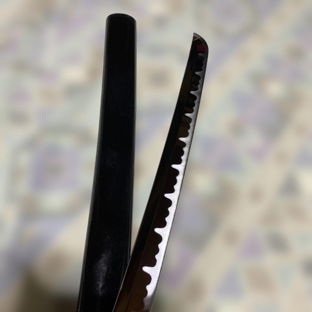 模造刀(小柄付) 黒柄 龍彫楕円鍔 黒呂鞘