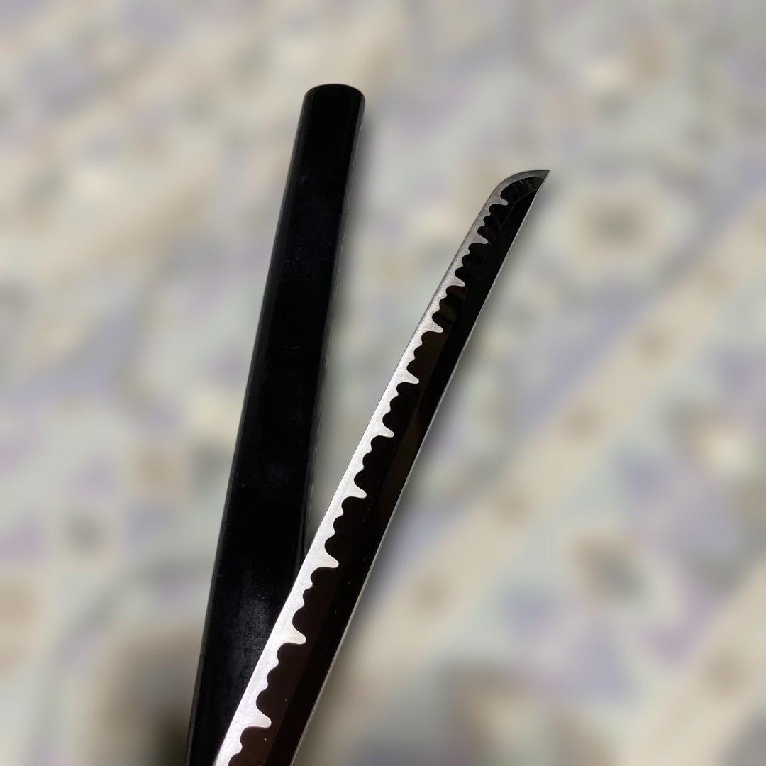 模造刀(小柄付) 黒柄 龍彫楕円鍔 黒呂鞘