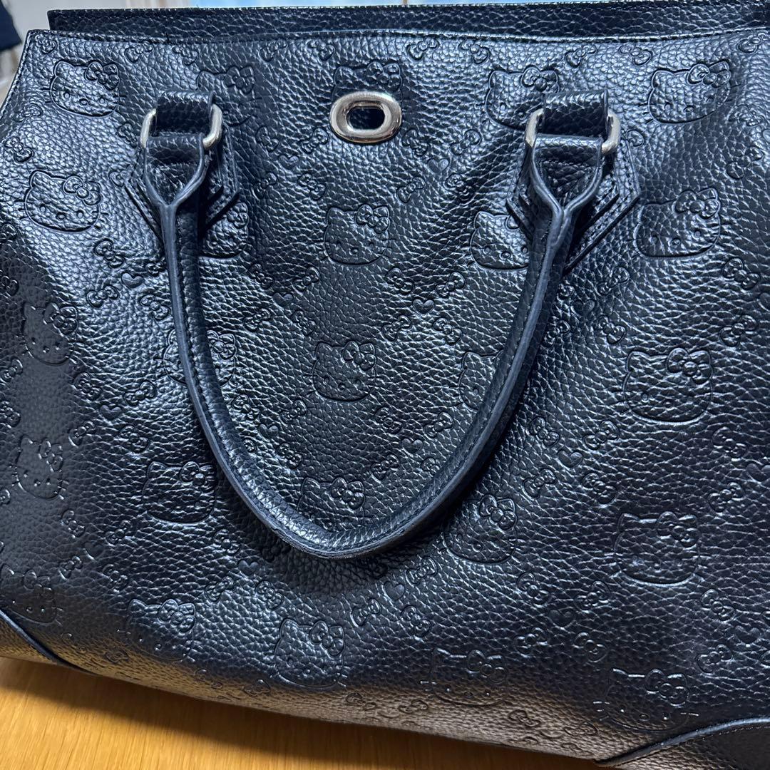 ラウンジフライ ハローキティ コラボ型押しトートバッグ 黒 - メルカリ